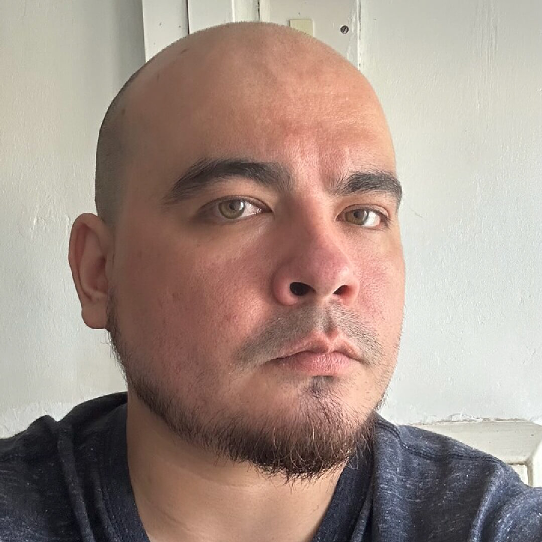 Head and shoulders picture of Justin Colombini.