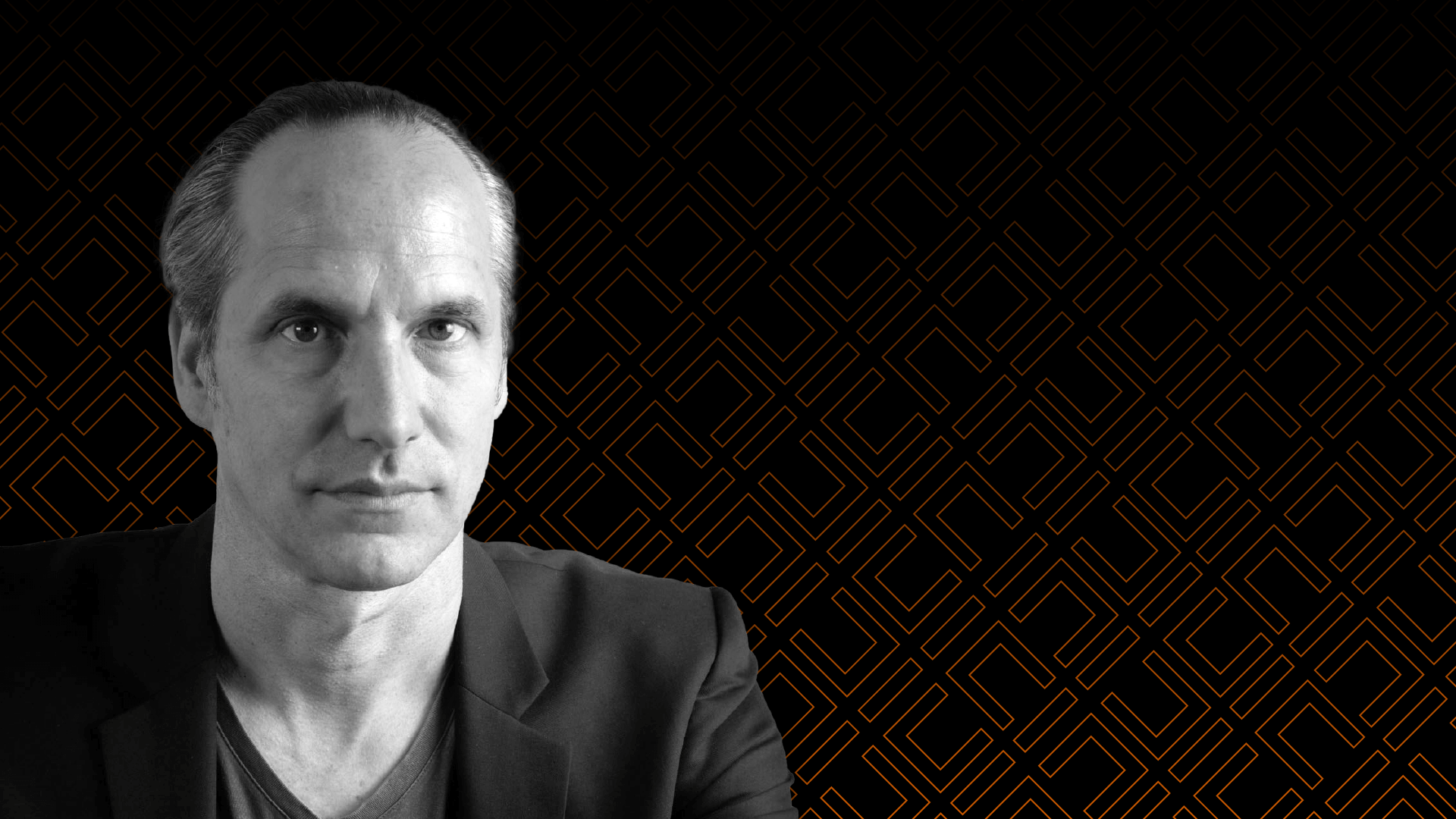 Image shows a blavk and white head shot of Andrew Schlussel against an Escape Studios branded background